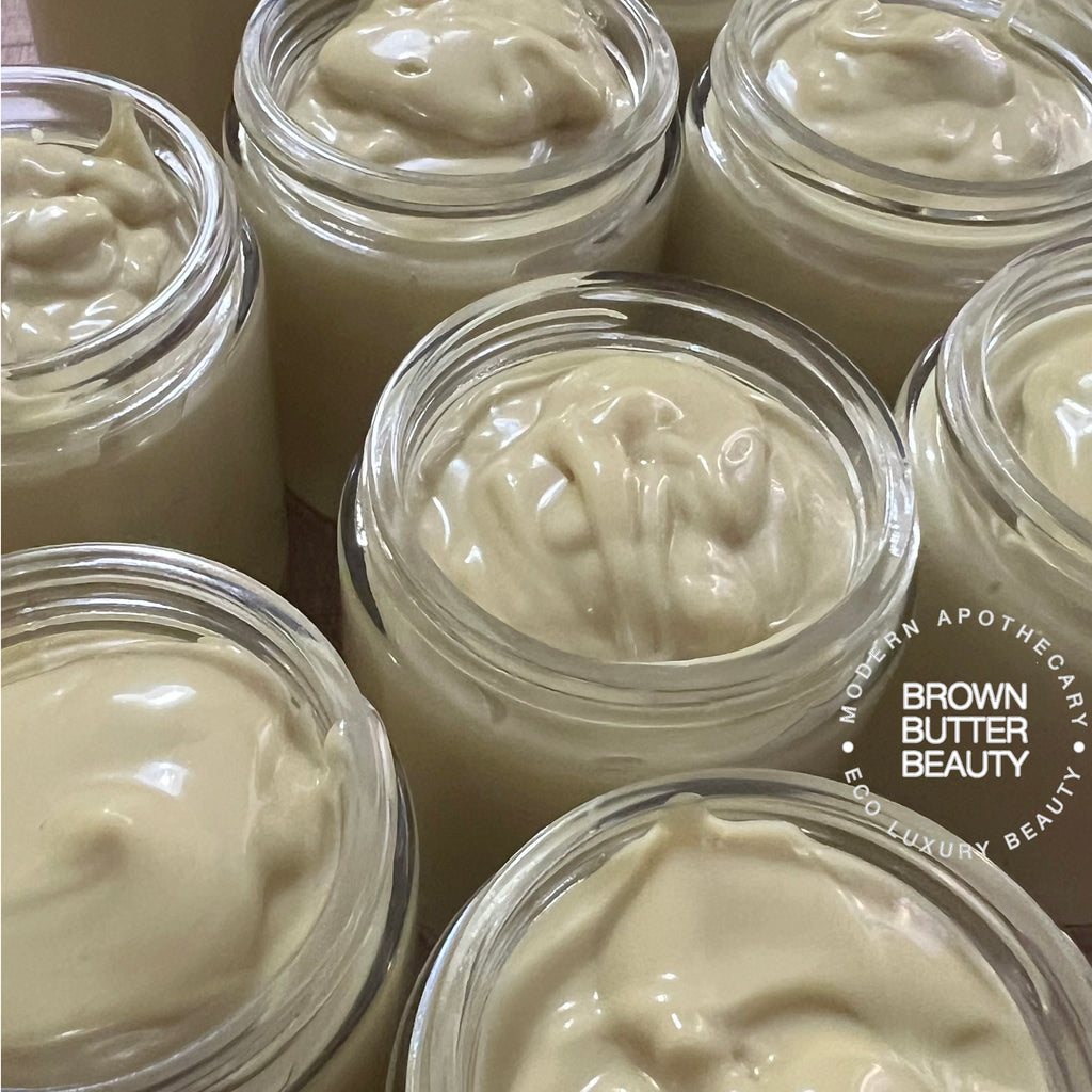 Artisan pumpkin seed butter in a glass jar, highlighting its creamy texture and rich color, ideal for nourishing and hydrating dry skin with organic ingredients.